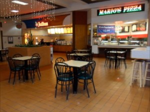 Dying food court (The Courtyard), only zombified Orange Julius and Mario's Pizza left. The obligatory pretzel joint moved to center court.  Mrs. Powell's, Dairy Queen, the corn dog place and others all died.